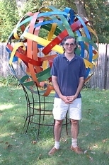 George Hart poses with one of his geometric sculptures.