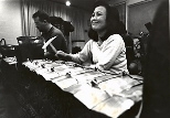 Balinese composer Desak Made Suarti Laksmi performs with a gamelan orchestra.