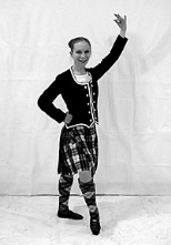 Jen Schoonover strikes a pose in her Scottish clothes.
