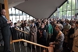 President Charles M. Vest addresses MIT community members at an informal version of the State of the Institute Forum on Monday afternoon. A power outage in Cambridge forced the planners to hold the event in Kresge lobby instead of inside the auditorium.