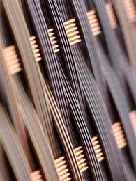 The above image is a close-up photo of a spectrometric fabric. Each fiber has a built-in photodetecting element and is sensitive to a different wavelength.