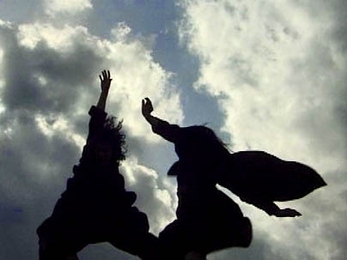 Image from the video 'TILT,' by Paula Josa-Jones and Ellen Sebring, featuring dancers Alissa Cardone and Ingrid Schatz.