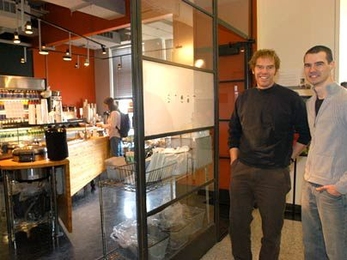Architecture graduate students Scott Francisco, left, and Nick Senske spearhead the design and menu of the new Steam Cafe, located on the fourth floor of MIT's Building 7.