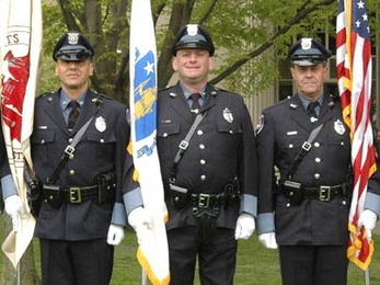 Officers, from left, Robert Molino, Kevin O'Connor and William Smith represent the MIT Campus Police Honor Guard at President Hockfield's inauguration. The honor guard will be leading the Commencement procession on Friday.