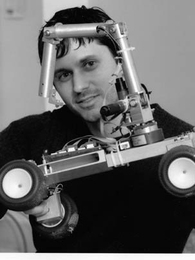 MIT research scientist Karl Iagnemma, who works on rovers like this one to explore the planet Mars, may get the chance to explore planet Hollywood now that Warner Brothers has purchased the screen rights to his 2003 collection of short stories.