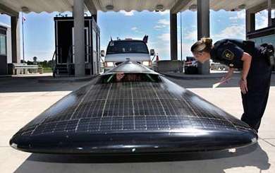 MIT's solar car Tesseract, which recently place third in the North American Solar Challenge, crosses the border at Winnipeg, Manitoba.