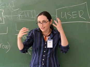 Maria 'Masha' Kamenetska, an MIT undergraduate, instructs participants in the Middle East Education Through Technology program earlier this summer. The program brings Israeli and Palestinian high school students together to learn computer science, entrepreneurship and leadership skills.
