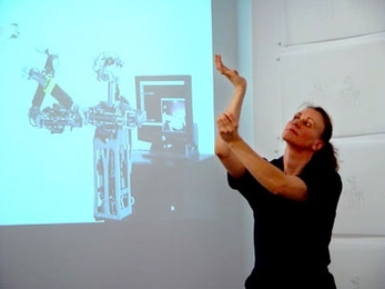 MIT alumna Pia Lindman performs with the robot Domo at the Luxe Gallery in New York City. Her solo show, 'Pia Lindman: Embodiments,' opens at the MIT Museum's Compton Gallery on April 18.