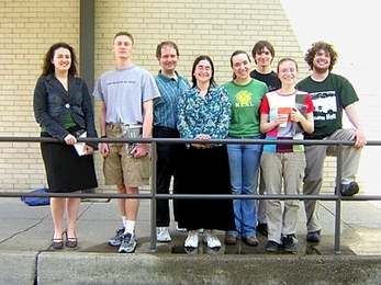 The Todd Anderson Award for Excellence in Teaching went to seven students in the Experimental Studies Group. They are, from left to right, Brigid Dwyer, Colin Dillard, Todd Anderson (ESG alum who funds the awards), Kayla Jacobs, Jocelyn Rodal, Austin Clements, Nadezhda Belova and David Roe