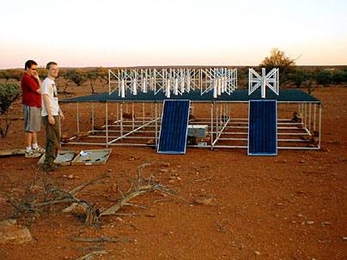 Students help construct a prototype in April 2005 of one of the 500 'tiles' that will make up a new telescope in Australia. Each tile consists of 16 antennas. From left are Jamie Stevens, a graduate student at the University of Melbourne, now at University of Tasmania, and Judd Bowman, a graduate student in physics at MIT.