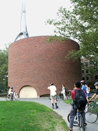 Graduate students on the 'Art on Wheels' tour stop outside the MIT Chapel on July 11. The chapel's spire and bell tower were designed by sculptor Theodore Roszak.