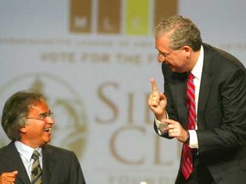 Democrat Chris Gabrieli, right, makes a point to independent Christy Mihos during a forum on environmental issues for Massachusetts gubernatorial candidates held July 12 at MIT's Kresge Auditorium.