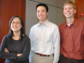 Annette Kim, assistant professor, urban studies and planning, left, Elliot Hui, postdoc, Harvard-MIT Division of Health Sciences and Technology, and Troy van Voorhis, assistant professor, chemistry, discussed faith and development.
