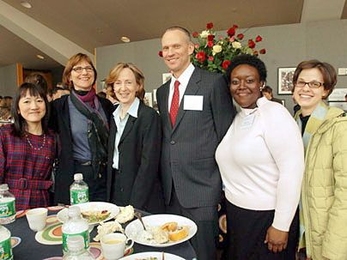 Tamako Harrington, Judy Daniels, President Susan Hockfield, Jim Harrington, Elizabeth Pierre and Jamie Fabianski celebrated after Jim Harrington won an Excellence Award.