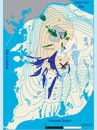 In this 2005 illustration of the "shoulder" of the Cape, the Cape Cod Canal is visible at the top. If the land is viewed as a clock, Bourne is at 11, Sandwich at 12:15, Barnstable at 3 and Mashpee at 5:30. Falmouth is in the bottom left corner. The salmon-colored area indicates the Massachusetts Military Reservation. Green indicates groundwater contaminant plumes made up mostly of explosive compou...