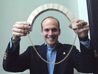 MIT architecture professor John Ochsendorf with wooden arch (above) and chain (making arch) below. He will be a fellow at the American Academy in Rome next year.