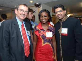 Alumnus Carl King (S.B. 1965), sophomore Patricia Lubwama and senior Raja Bobbili chat at the Sept. 4 opening of iHouse, a new living and learning center for MIT students.