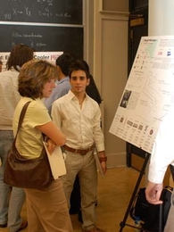 Sophomore Xavier Gonzalez, right, shows his team's poster to judge Cora Leibig, an MIT alum who works at Dow Chemical. Gonzalez' team, Biogas Nicaragua, finished second in the MADMEC contest, held Sept. 25, 2007. <a onclick="MM_openBrWindow('madmec-1-enlarged.html','','width=509, height=583')">
<span onmouseover="this.className='cursorChange';">Open image gallery</span>
</a>
<noscript> <a href=...