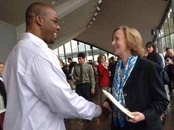 MIT President Susan Hockfield greets Lawrence Neeley, a postdoctoral associate in mechanical engineering, following the Oct. 2 State of the Institute Forum in Kresge Auditorium on Oct. 2.