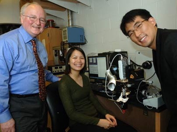 Professor Harry Tuller, left, leads a team that has found a way to print useful devices, like gas sensors, from inkjet printers. At far right is Woochul Jung, graduate student in material sciences and engineering, and at center is Amy Leung, a sophomore in chemical engineering; between them is the printing device.