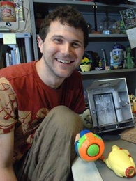 Mechanical engineering graduate student Barry Kudrowitz, who teaches a toy product design course at MIT, began his design life building an Epcot theme park out of LEGOs. Here he is shown with some of his more
recent creations.