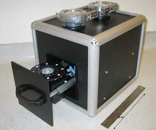 This prototype of the PANTHER device is about one cubic foot and weighs 37 pounds.