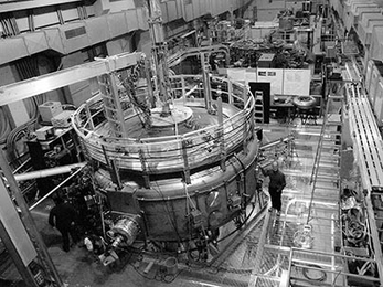 Senior research scientist Jay Kesner stands by the now-operational LDX fusion reactor, in which a series of experiments are being run.