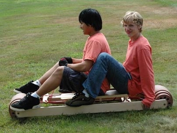 Members of the Design Squad Red Team test their prototype 'summer sled' for L.L. Bean. <a onclick="MM_openBrWindow('design-sled-enlarged.html','','width=509, height=583')">
<span onmouseover="this.className='cursorChange';">
<strong>Open image gallery</strong>
</span>
</a>
<noscript> <a href="design-sled-enlarged.html">
<em>(no JavaScript)</em>
</a>
</noscript>