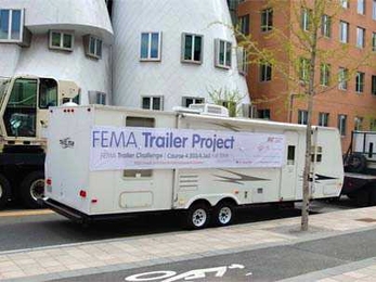 A FEMA trailer en route to the MIT campus, where it will form the centerpiece of a new course on research as artistic practice.