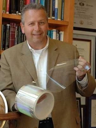 Dr. Joseph DeSimone of the University of North Carolina at Chapel Hill is the 2008 recipient of the $500,000 Lemelson-MIT Prize for his inventions in green manufacturing, nanomedicine and medical devices, in addition to his lab-to-market entrepreneurship and commitment to mentorship. Here, polymer expert DeSimone holds a drum of his PRINT molds, which can manufacture highly customizable and contro...