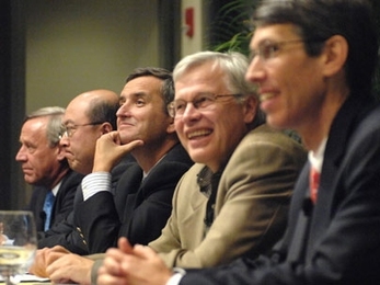 A panel of MIT faculty experts convened Oct. 7 to discuss current economic news. From left are William Wheaton, director of the Center for Real Estate; Andrew Lo, Harris and Harris Group Professor, Sloan School of Management; Ricardo Caballero, head, MIT Department of Economics; Bengt Holmstrom, Paul A. Samuelson Professor of Economics, and James Poterba, Mitsui Professor of Economics.