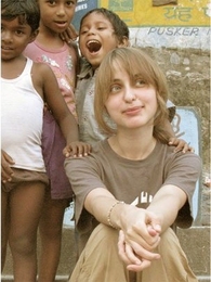 Anna Kotova with kids they came across in a recent visit to some villages in India.