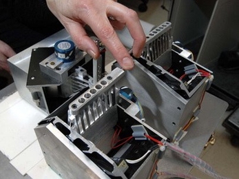 Researchers in RLE, led by Charlotte Reed, are using the sense of touch to develop communication aids for the profoundly deaf. The devices convert sound waves to vibrations, which the deaf person holding the device can feel, and help lip-readers identify sounds that can be difficult to distinguish visually.