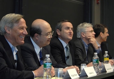 A panel of MIT faculty experts convened March 31 to discuss "The Current Financial Crisis...Is there an End in Sight?" in 10-250. From left are William Wheaton, director of the Center for Real Estate; Andrew Lo, Harris and Harris Group Professor, Sloan School of Management; Ricardo Caballero, head, MIT Department of Economics; Bengt Holmstrom, Paul A. Samuelson Professor of Economics, and James Po...