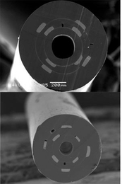 A Micrograph showing the cross-section of a new optoelectronic fiber.
