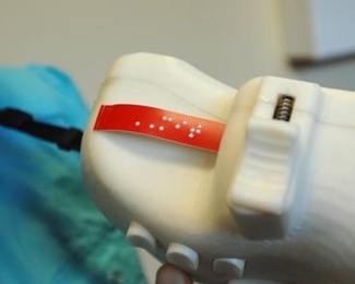 A close up of the 6dot Braille Labeler, a device created by MIT students to enable blind or visually impaired people to make labels for objects easily and inexpensively.