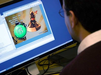 A visitor tests his hand at playing 'Pierre' at the Singapore-MIT GAMBIT Game Lab one Friday afternoon.