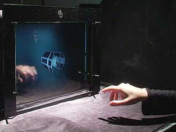 Media Lab researchers demonstrate a laboratory mockup of a thin-screen LCD display with built-in optical sensors.