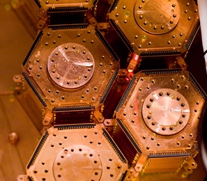 Dark matter detectors. The Cryogenic Dark Matter Search experiment uses five towers of six detectors each.