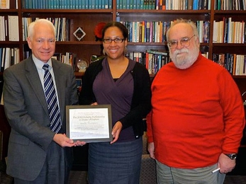 2010 Doherty Professorship in Ocean Utilization recipient Janelle Thompson, center, with Vice President for Research and Associate Provost Claude Canizares, left, and MIT Sea Grant College Program Director Chryssostomos Chryssostomidis.