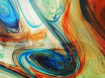 The Weather in a Tank curriculum includes several rotating tank experiments, that are designed to help students understand how Earth's atmosphere
and oceans work - an image from the Dye stirring experiment is shown here.