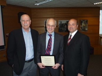 2009 Martore Award winner Don Rosenfield, center, with ESD Director Yossi Sheffi, left, and Joe Martore, right.