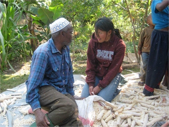 Jodie Wu conducting a needs assessment with farmers in Tanzania 