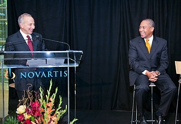 At Wednesday’s announcement, President of the Novartis Institutes for BioMedical Research Mark Fishman, left, was joined by Governor Deval Patrick. The event took place at Novartis’s current Massachusetts Avenue campus.