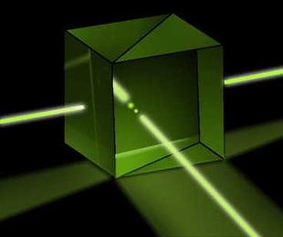 A beam splitter is a device, like the one depicted here, that bifurcates a beam of light. An experiment proposed by MIT researchers, which relies on beam splitters, would exploit the strange behavior of quantum particles to perform calculations that are hopelessly time consuming on conventional computers.
