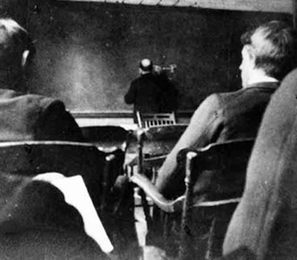 Charles Cross, a member of MIT's third graduating class and chair of the MIT physics department when, in 1882, he created the country's first electrical-engineering curriculum, right and at blackboard, above.