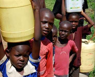 Children collecting water as part of a J-PAL study in western Kenya.