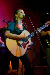 Vanessa Kafka, MBA 12, peforming at her CD release party in Boston.