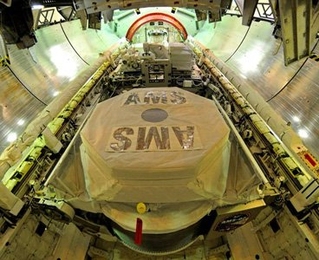 Alpha Magnetic Spectrometer experiment ready for launch in Endeavour’s payload bay.