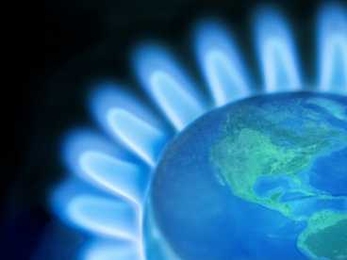 Photo illustration of a stovetop gas burner with an image of the world at the center